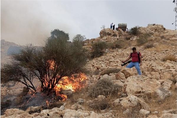 اطفاء حریق در کوهستانهای اطراف منطقه عملیاتی آغار و دالان 2