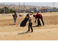 پاکسازی ساحل خلیج همیشه فارس توسط کارکنان منطقه عملیاتی نار و کنگان 12