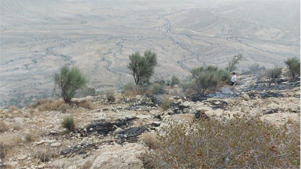 اطفاء حریق در کوهستانهای اطراف منطقه عملیاتی آغار و دالان 3